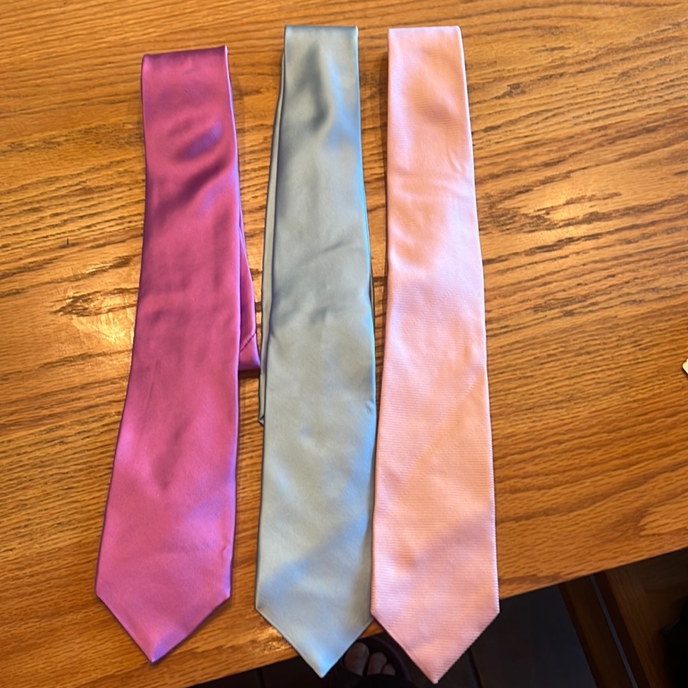 3 Designer 100% silk ties. Never worn.  Perfect condition